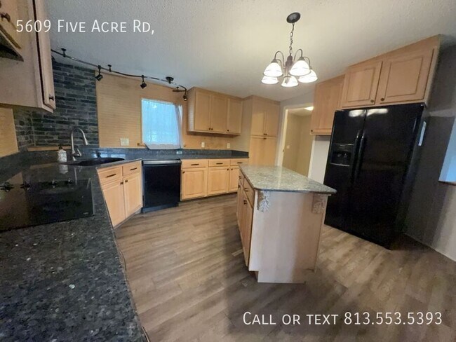 Building Photo - 5609 Five Acre Rd