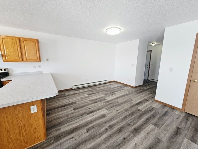 Building Photo - Fully Remodeled 1,250 Sq Ft 2 Bedroom Apartment with Garage, In-Unit Laundry & Private Balcony – ...