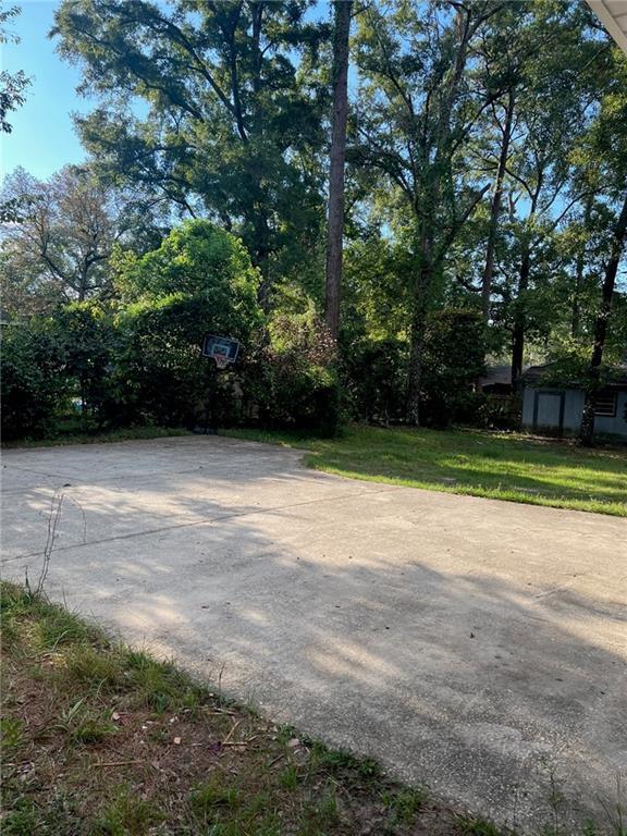 Building Photo - 4861 Woodcliff Dr N