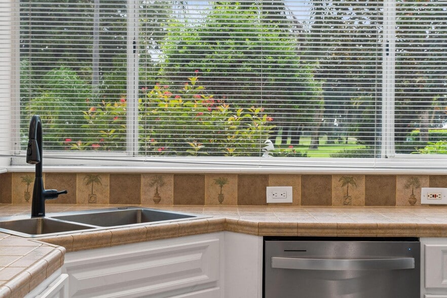 View from Kitchen - 7906 Swiss Fairways Ave