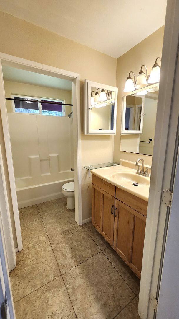 Building Photo - Ah Puck, Jordanah &amp; Tyson