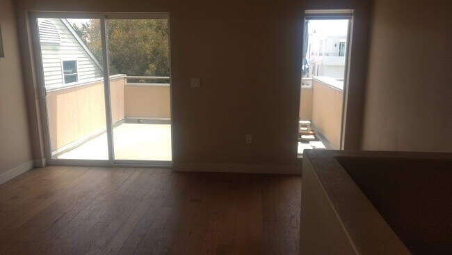 3rd flr living room area & deck - 1177 Nelrose Ave