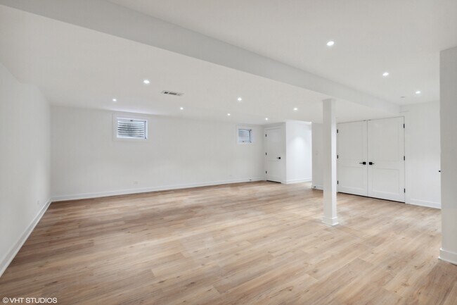 Basement Rec Room (ample closet storage). - 1003 Crystal Ct