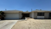 Building Photo - Three Bedroom Two Bathroom Pool Home in He...