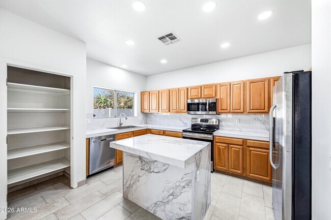 Building Photo - 9054 W Custer Ln