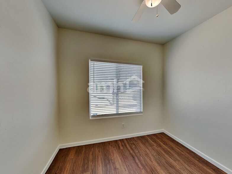 Building Photo - 6034 S Lostan Ave