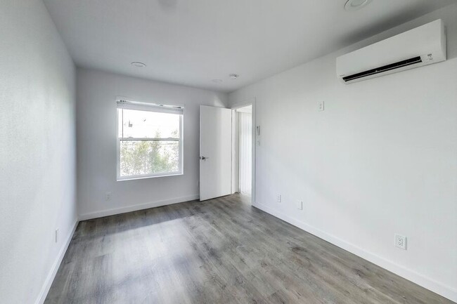 Building Photo - BRAND NEW 2 BEDROOM w/ Patio + W/D in unit