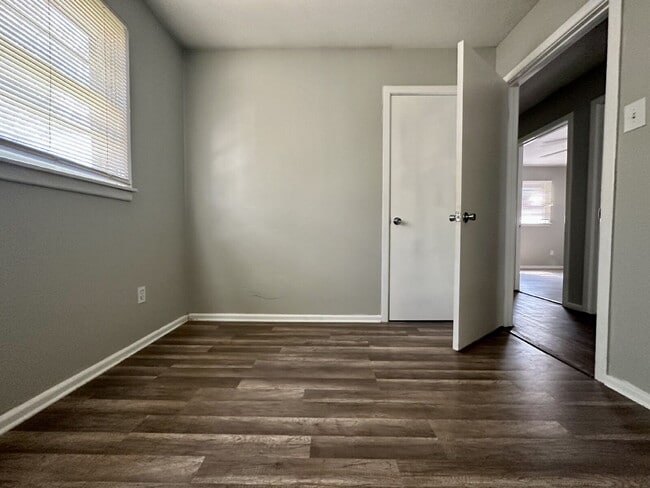 Building Photo - Updated Home with Gorgeous Floors & Large ...