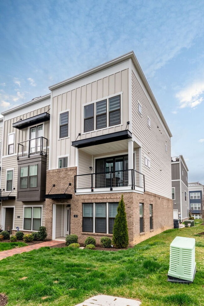 Building Photo - Modern End-Unit Townhome in Rocketts Landing with an Incredible Rooftop Terrace
