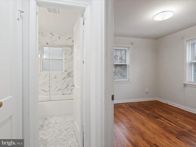 Building Photo - This home blends urban accessibility with peaceful natural surroundings.