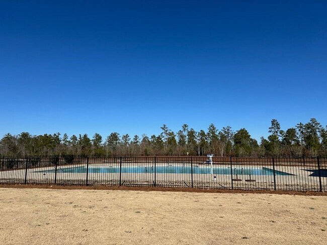 Building Photo - TOWNHOMES ACROSS FROM LAKE CAROLINA