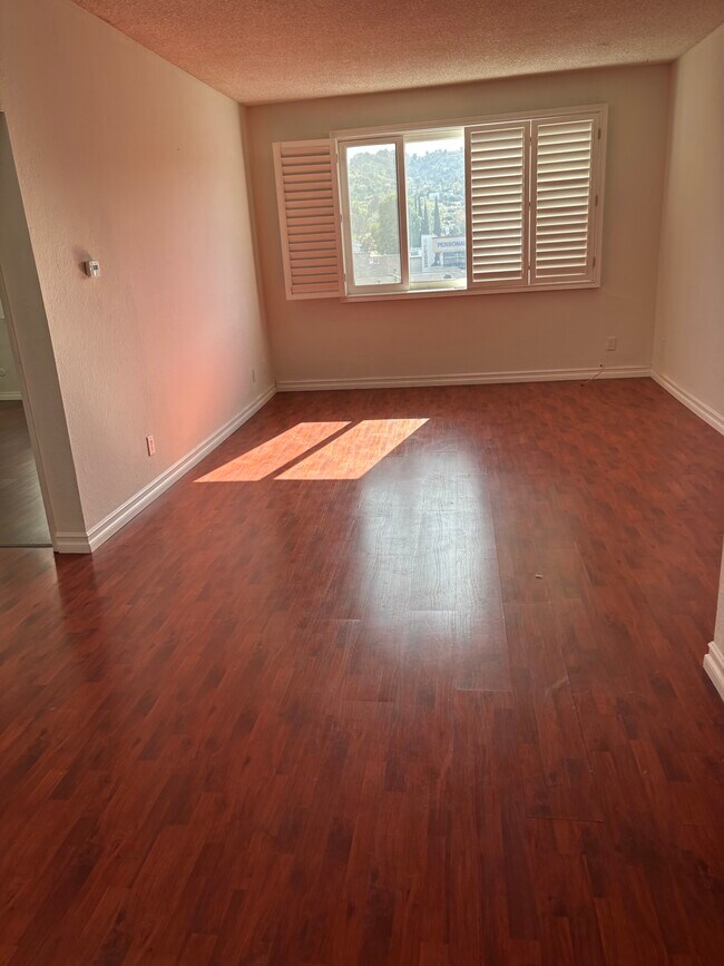 Building Photo - 4441 Woodman Ave