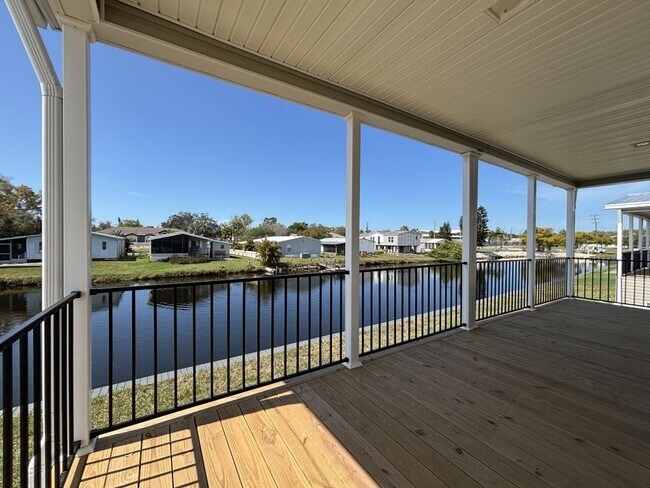 Building Photo - 5641 Blue Harbor Dr