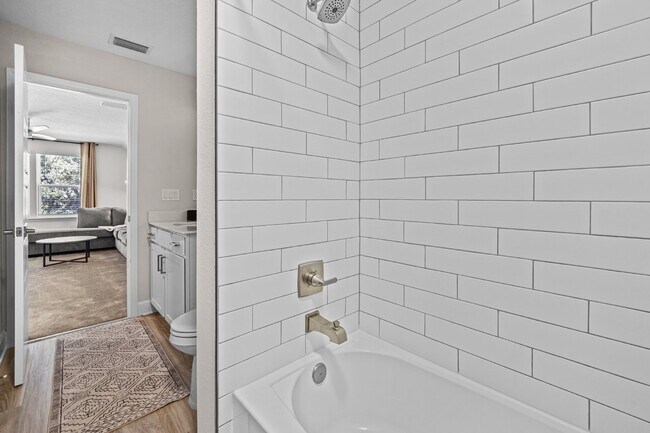Building Photo - "Luxurious Furnished Home with 4-Bed, 3-Bath, Swim Spa Fenced Yard Golf Cart steps to the beach!"