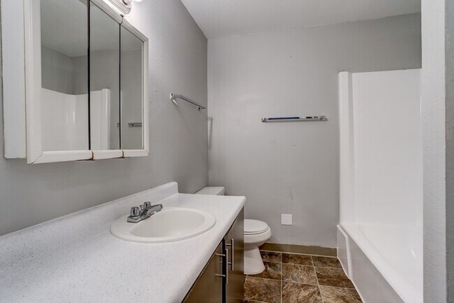 Building Photo - NOW LEASING : Spacious 2BR Upper Unit