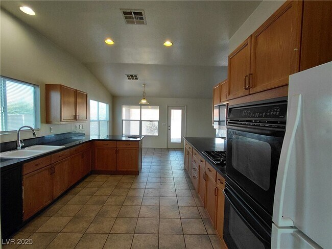 Building Photo - 6132 Peggotty Ave