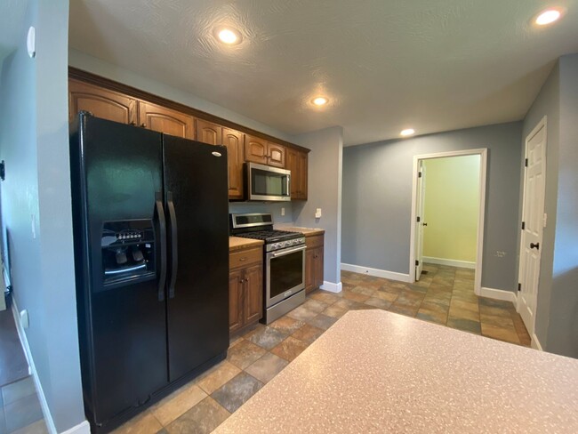 Building Photo - Your Dream Rental Awaits in Osage Hills – ...