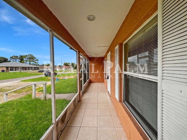 Building Photo - Make Yourself at Home — Your Duplex Dream Just Got Merrier! Charming 3-Bed, 2-Bath in Lehigh Acres