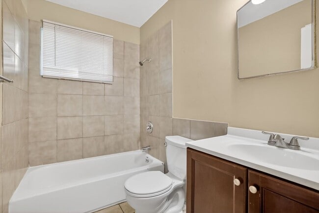 Building Photo - Unbeatable Prairie Village Location - 3BR/1BA Home, Fully Fenced Yard, Laundry Hook Ups, Attached...