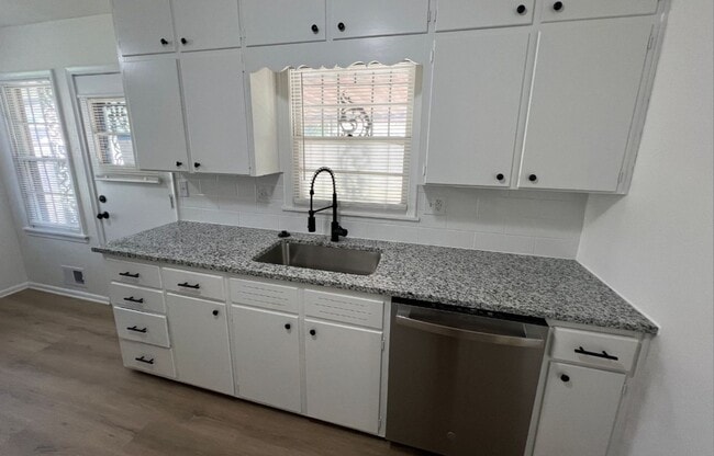 Building Photo - Spacious 4-Bedroom Home with Finished Base...