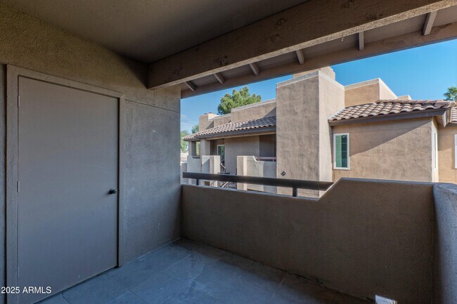 Building Photo - 9450 E Becker Ln