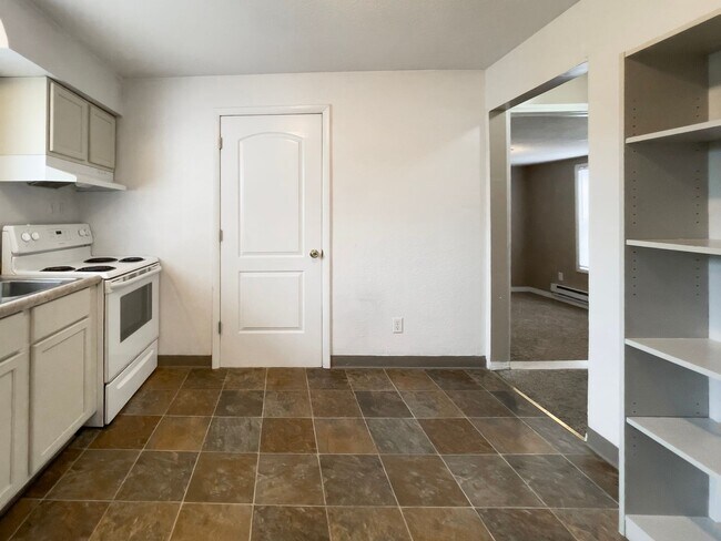 Building Photo - PRELEASING for AUGUST! Walk to Ball State! Bright 4BR Home with Fireplace