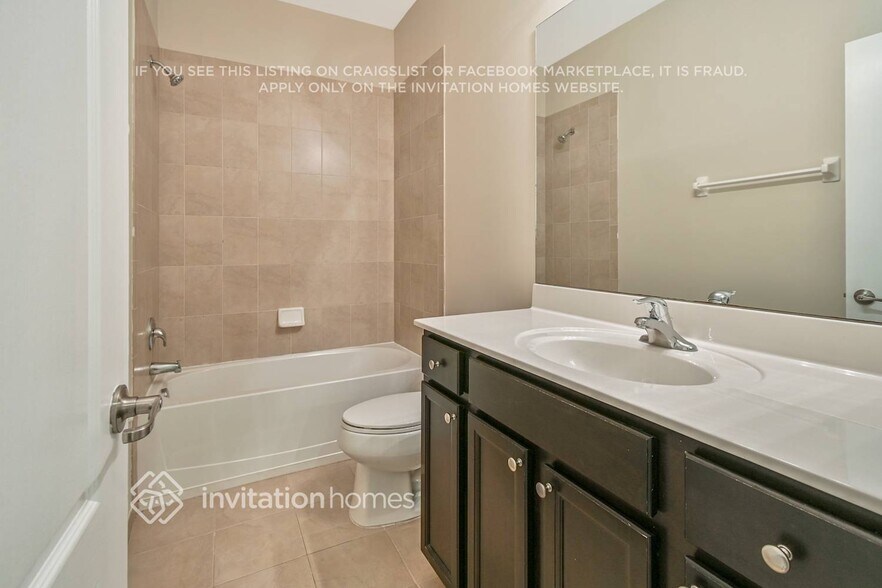 Building Photo - 9495 SW Merlin Ct