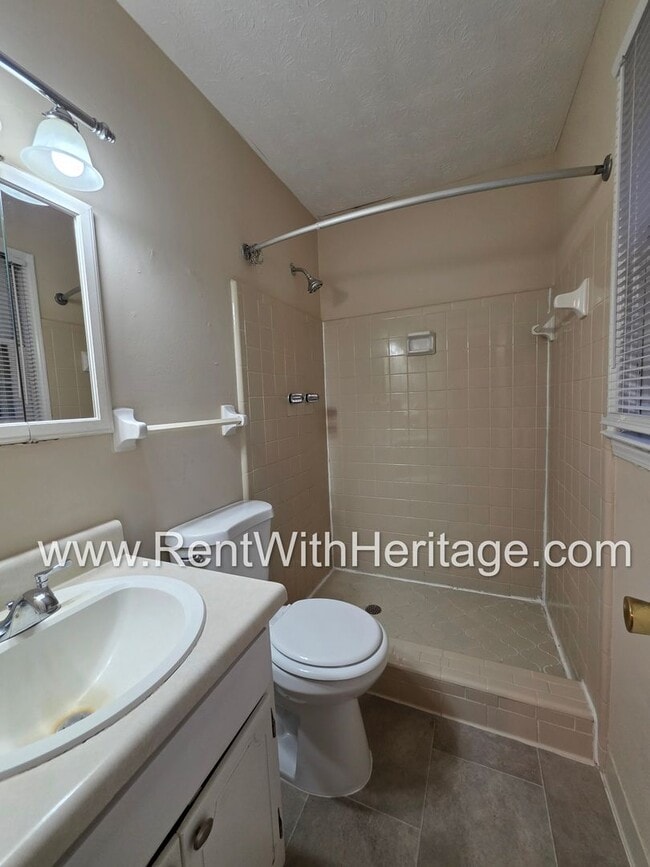 Building Photo - GREAT NEWS! 3 BEDROOM/ 2 BATH HOME WITH PARTIAL FINISHED BASEMENT