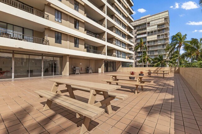 Building Photo - Wake Up to Stunning Mountain & Ala Wai Canal Views in the Heart of Waikiki