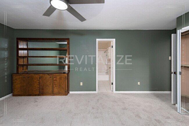 Building Photo - 3/2 Brick Home with Sunroom, Deck, and Car...