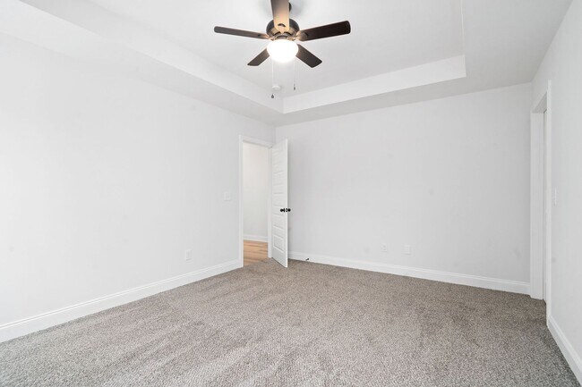 Building Photo - Pet Friendly Three Bedroom with Bonus!