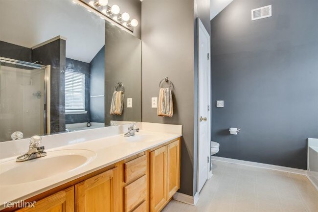 Building Photo - 4 br, 2.5 bath House - 1701 Portway CT.