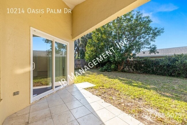 Building Photo - 10214 Oasis Palm Dr
