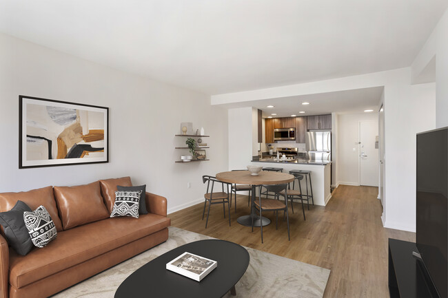 Updated Finishes kitchen, living, and dining area with hard surface flooring - AVA Fort Greene