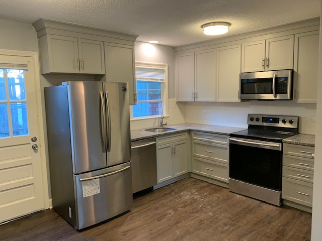 Kitchen all new cabinets and stainless steel appliances - 501 Edwards Rd