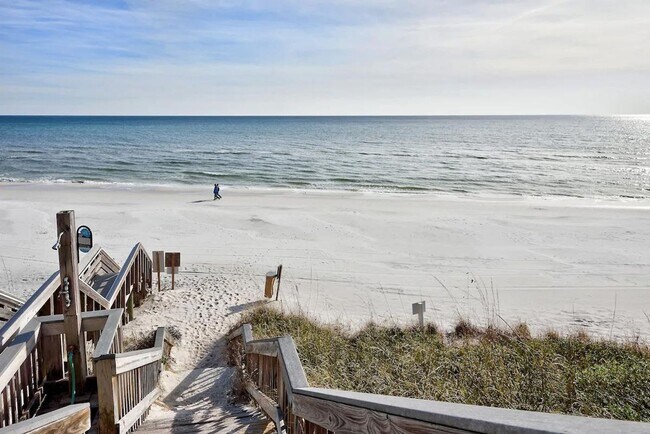 Building Photo - 50% off first months rent.  Gulf front com...