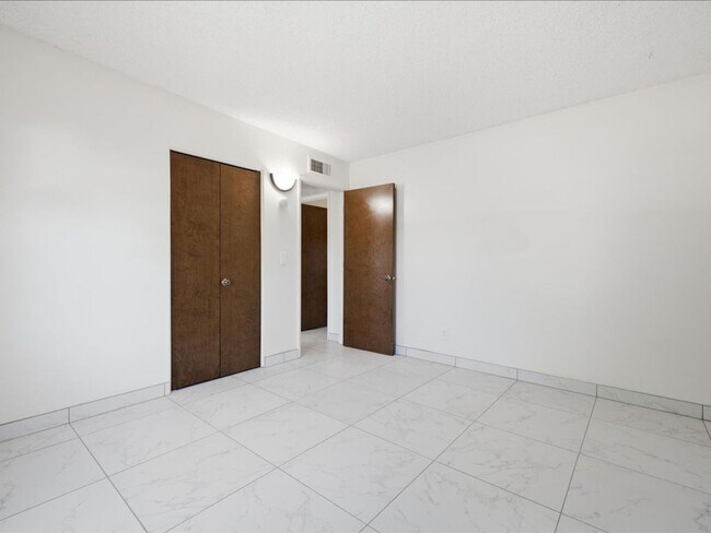 Building Photo - Concept Living with Large Enclosed Backyard & Modern Upgrades!