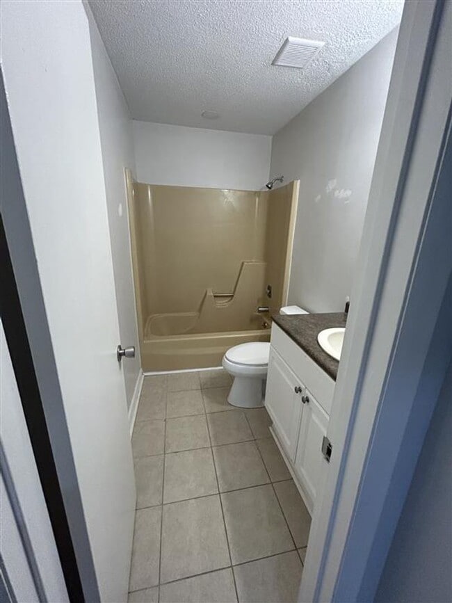 Building Photo - Charming and Affordable Upstairs Duplex – ...