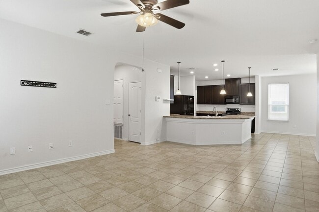 Building Photo - Single-Story Solar-Powered Home Near Braunig Lake – Comfortable & Convenient!