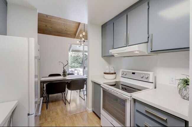 Building Photo - Tranquil Top-Floor End Unit with Stream Views & Resort Amenities — Blocks to Downtown