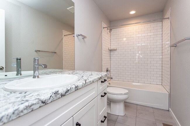 Building Photo - Spacious 5-Bedroom Home with Finished Base...