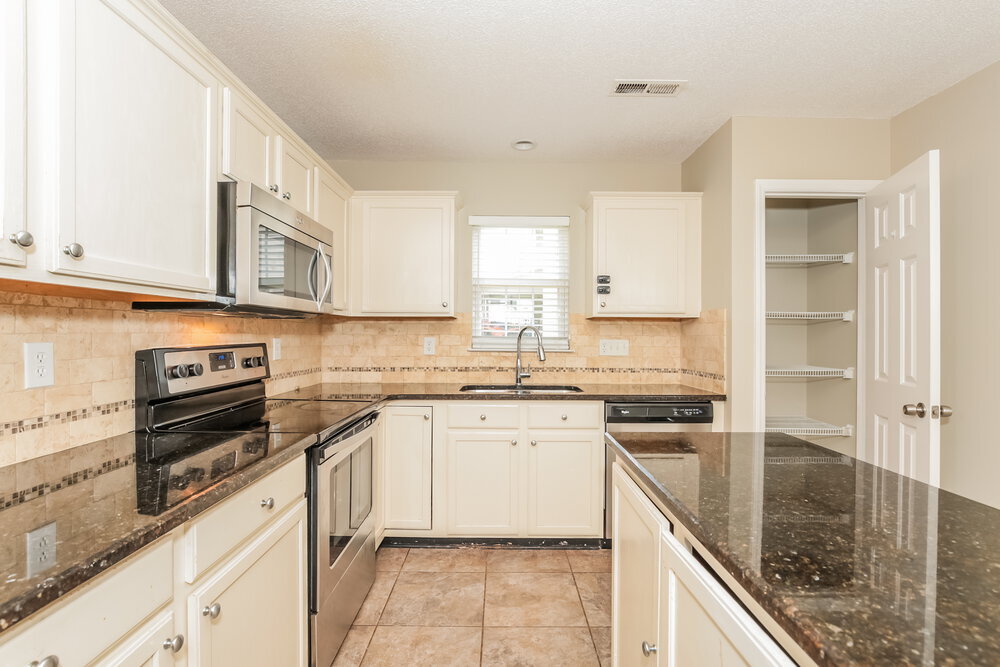 Building Photo - 5209 Carriage Woods Dr