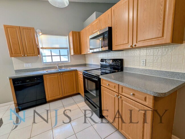 Building Photo - 2/2/1 1200sf Villa with Community Clubhouse & Pool... TRASH, LAWNCARE & BASIC CABLE INCLUDED!