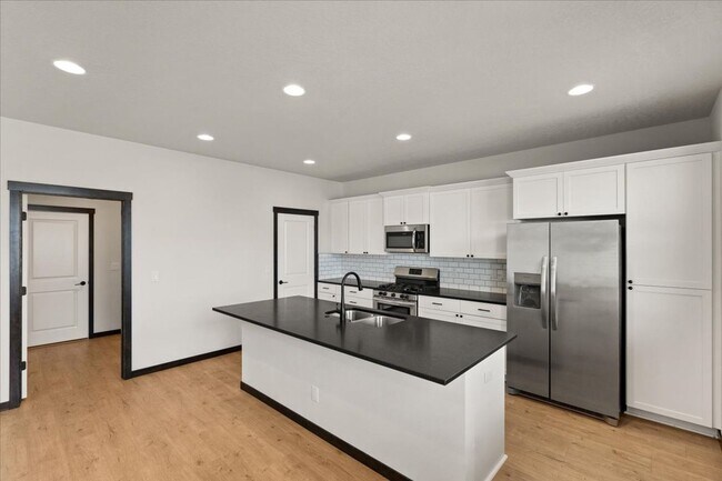 Building Photo - Spacious 4-Bedroom, 2.5 Bath, Two-Story Gem with a Fenced Yard!