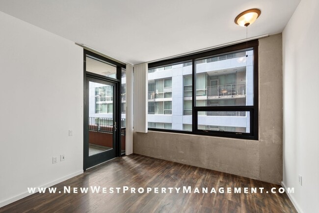Building Photo - Modern Icon one bedroom in the heart of East Village! Small Pet OK! Available Now! 1 Pkng Space I...