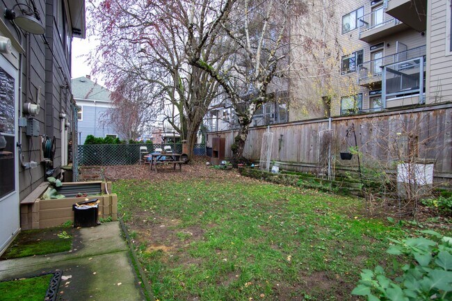 Building Photo - Gorgeous + Spacious 2-Bedroom Flat with Hardwoods, Dishwasher, Fireplace + Etc.!