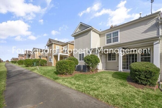 Building Photo - Charming Townhome with Open Layout, Back Patio & One-Car Garage – Near RTP, RDU & Everyday Conven...