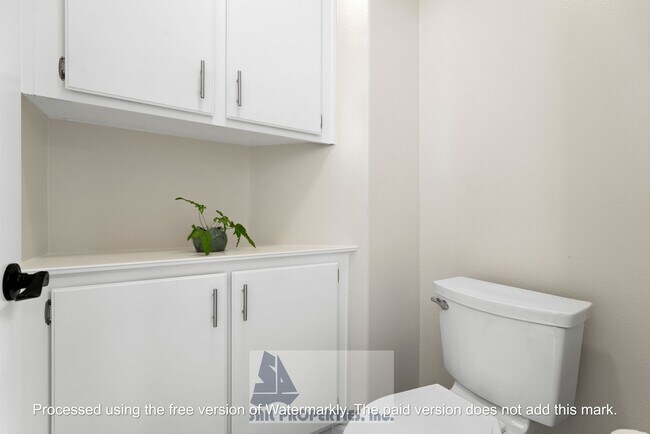 Building Photo - Welcome to this stunning 2-bedroom condo in gated community