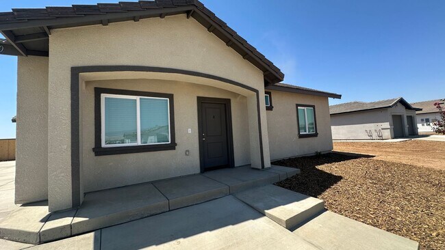 Building Photo - Coyote Run Duplexes 6000