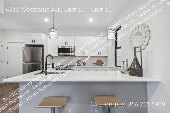 Building Photo - 6211 Woodbine Ave
